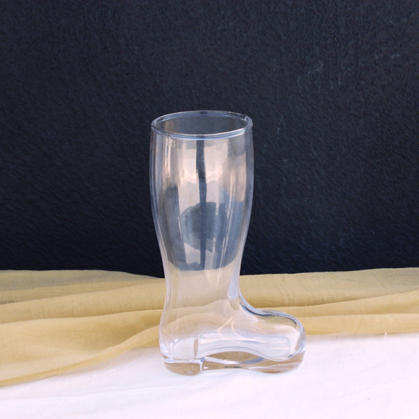 Chilled beer poured in a unique shoe shaped beer glass 