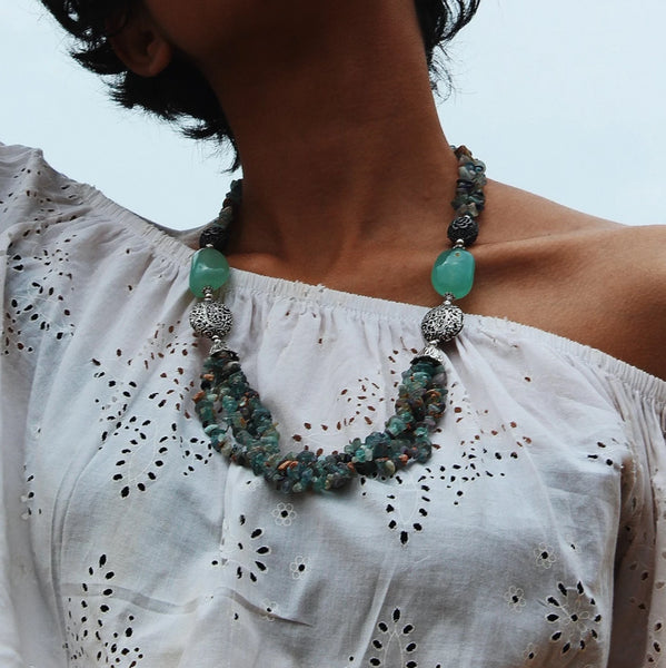 Women wearing our Mystery of the Ocean neck piece made from semi precious stone