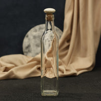 Exquisite water glass bottle with wooden knob as its cap