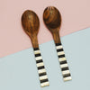 Set of two salad serving spoons that are a fuse of mother of pearl and rustic wood.